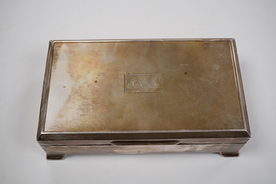 An Elizabeth II part engine turned silver rectangular cigarette case, by S.R. Rose & Son, London, 1955, with engraved initials, 15cm.